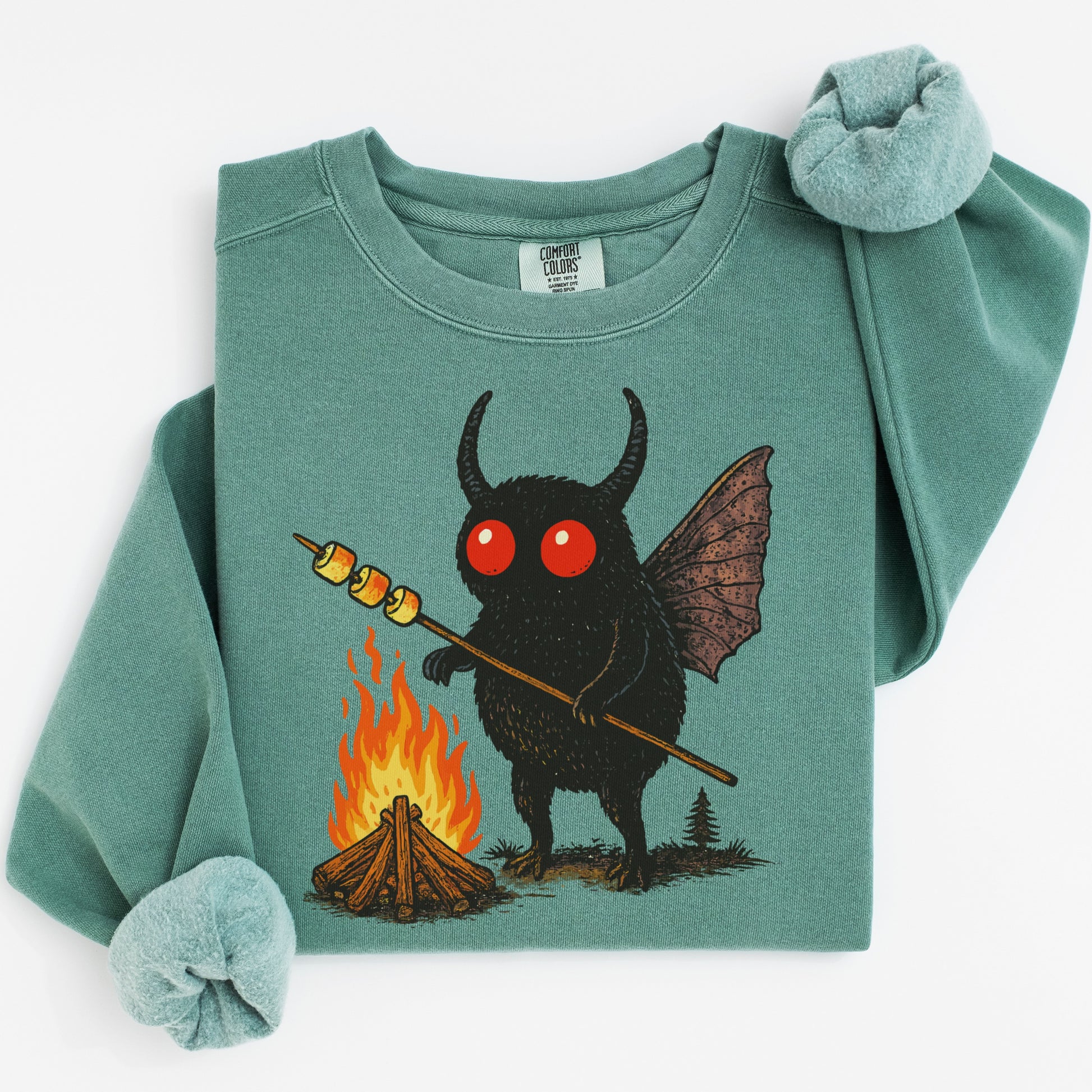 Quirky Monster Roasting Marshmallows Graphic Shirt product