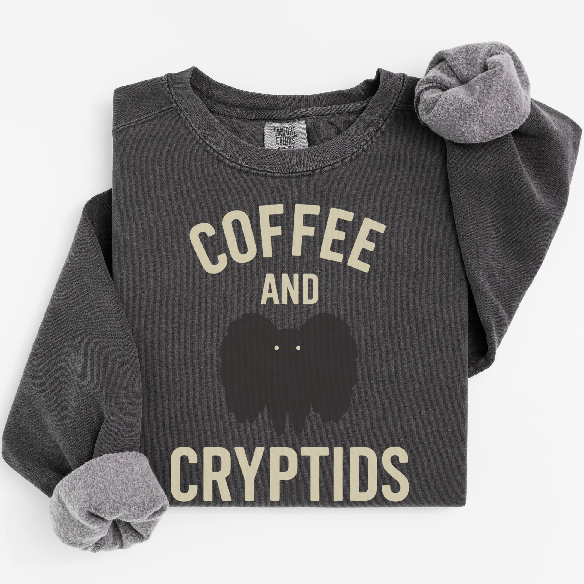 Coffee and Cryptids Graphic Crewneck product type