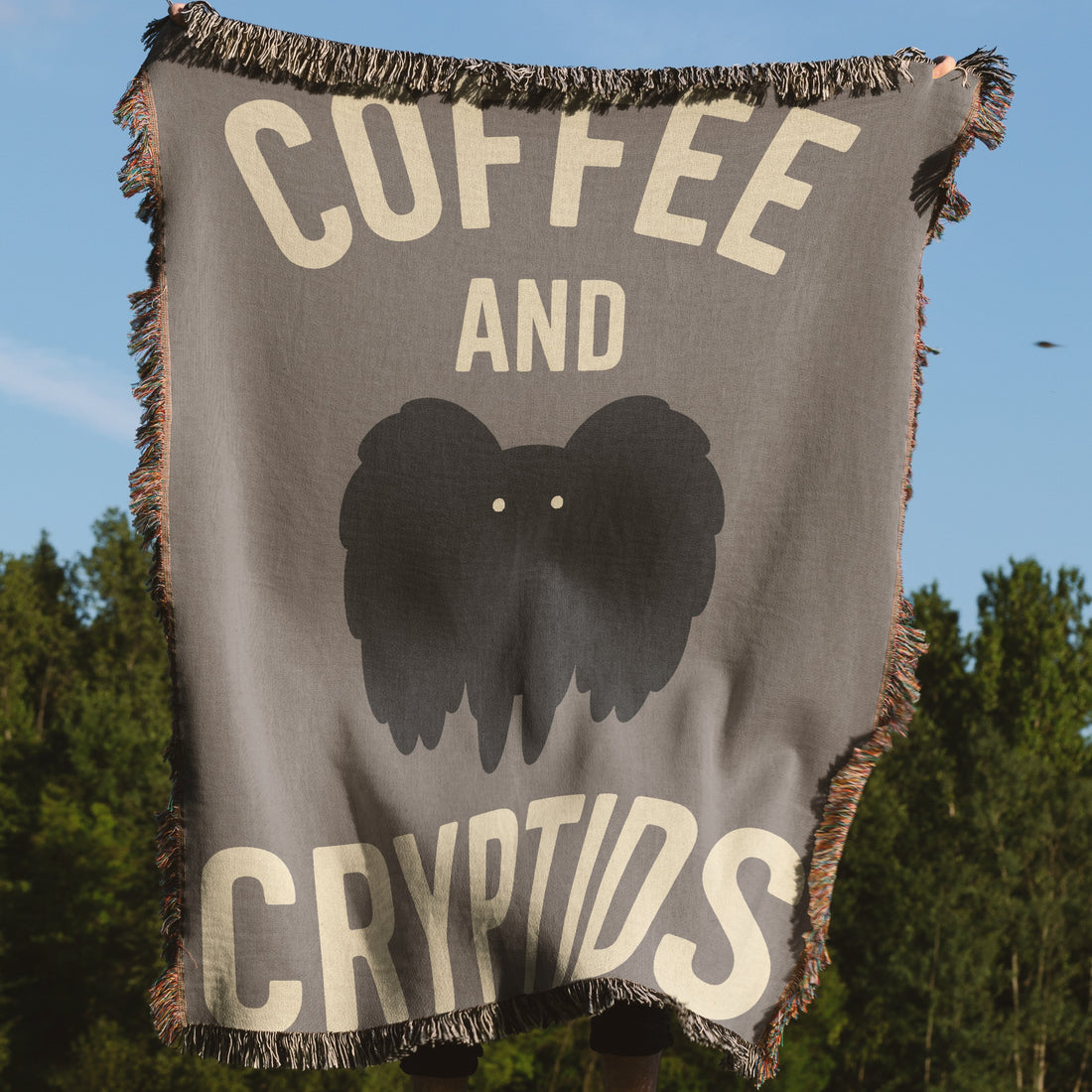 Cozy Coffee and Cryptids Blanket Product