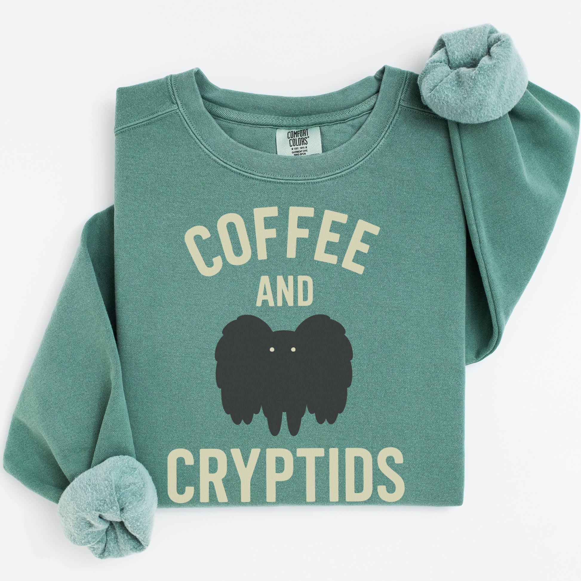 Coffee and Cryptids Graphic Sweatshirt product type