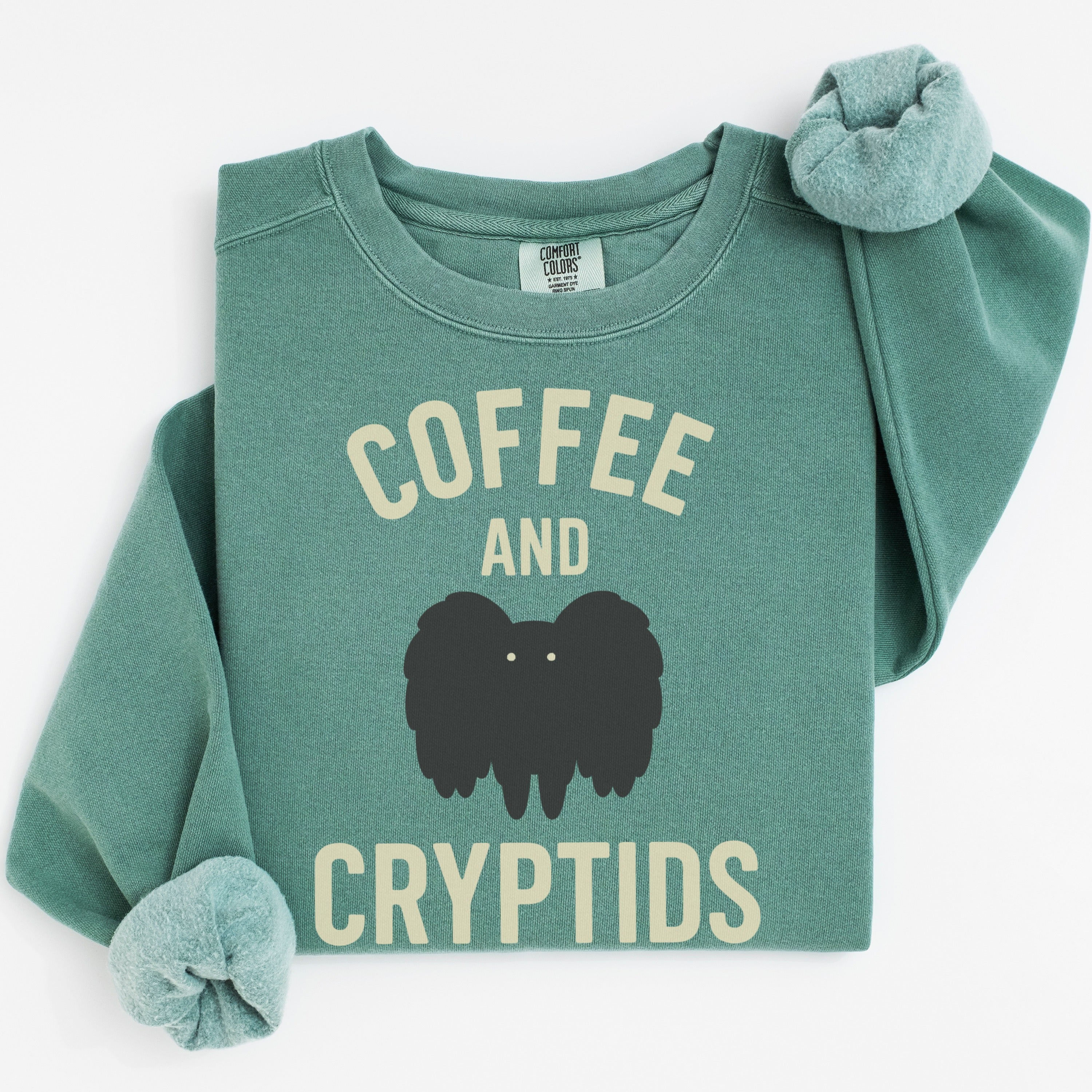 Coffee and Cryptids Graphic Sweatshirt product type